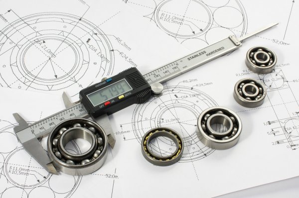 depositphotos_94113080-stock-photo-bearing-and-caliper-on-the