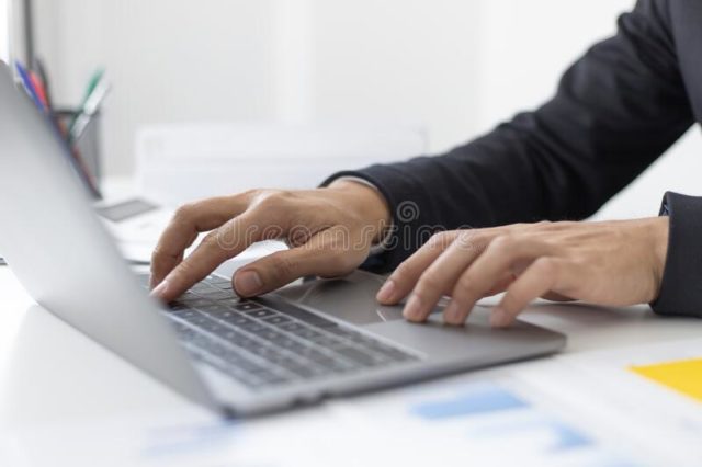 young-asian-office-worker-presses-finger-laptop-keyboard-to-analyze-financial-data-summarize-her-work-private-212867201