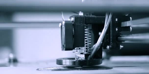 depositphotos_242525224-stock-video-printer-working-fused-deposition-modeling